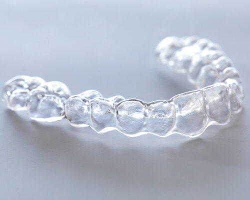 Inivisalign braces or aligner. A way to have a beautiful smile and white teeth.